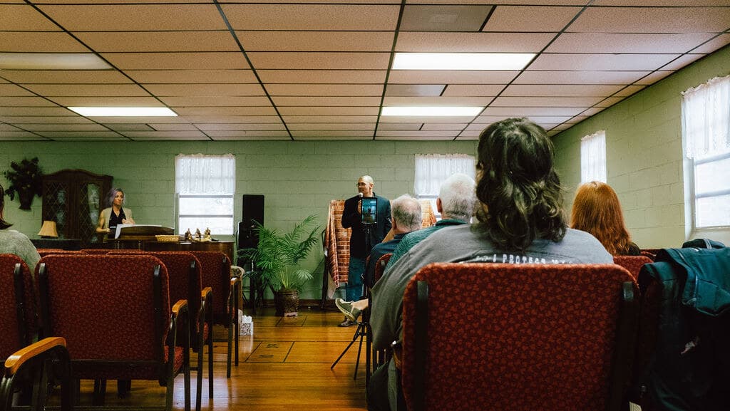 Sunday morning at Open Door Fellowship — Pastor Justin preaching to the congregation